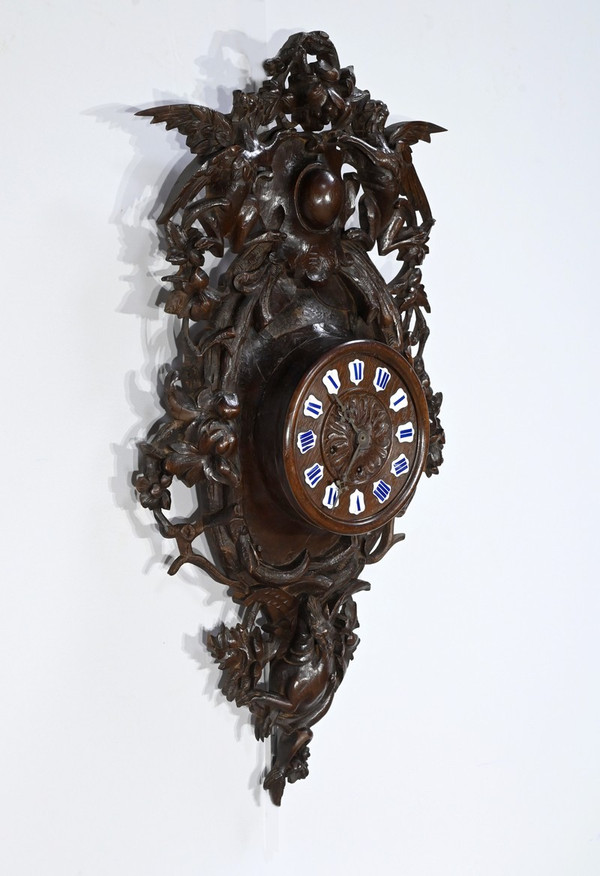 Important Oak clock, Renaissance style - Early 20th century