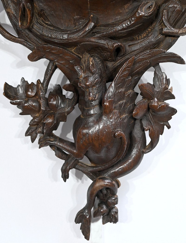 Important Oak clock, Renaissance style - Early 20th century