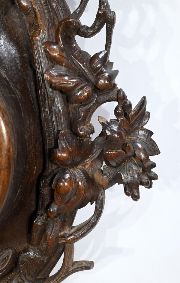 Important Oak clock, Renaissance style - Early 20th century