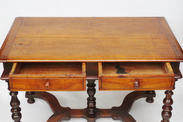 Louis XIII writing table in natural wood.