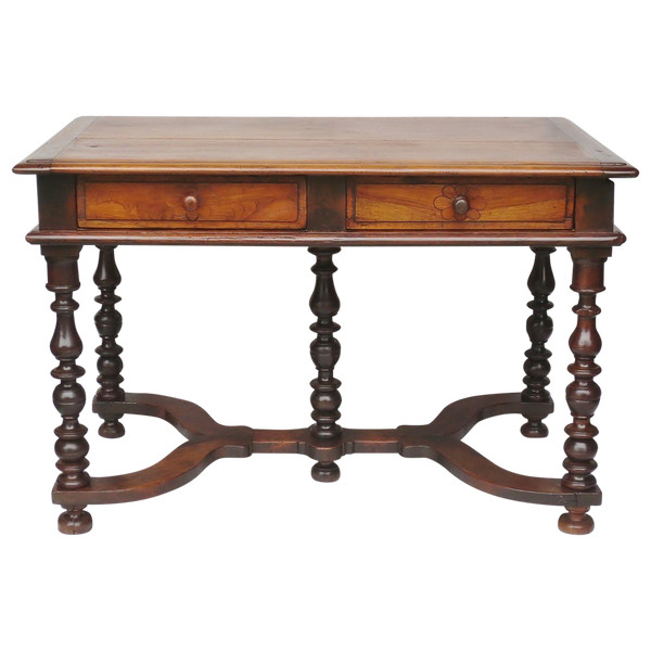 Louis XIII writing table in natural wood.