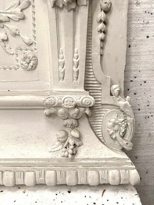 Decorative panel or door top in wood and patinated stucco 19th century