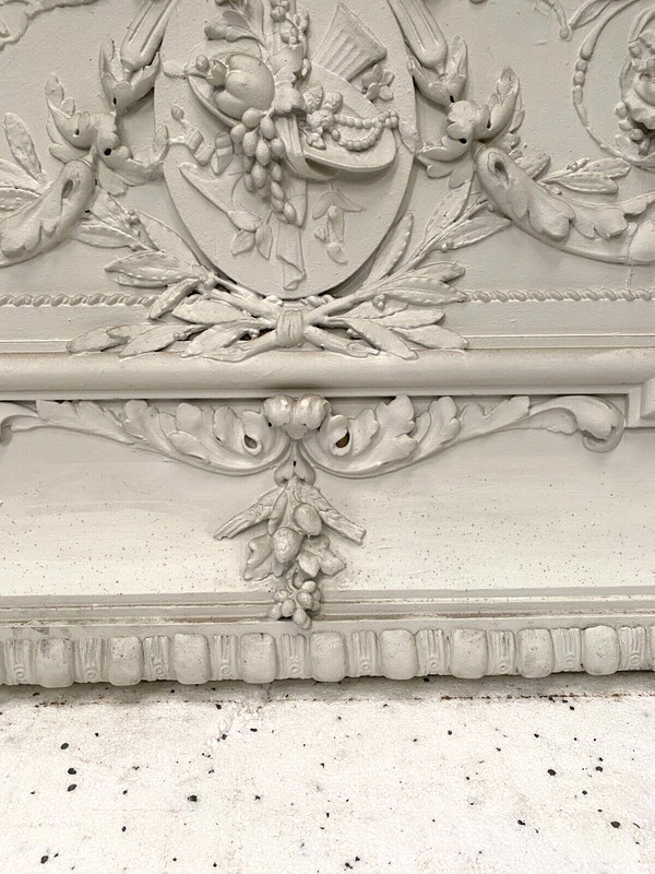 Decorative panel or door top in wood and patinated stucco 19th century