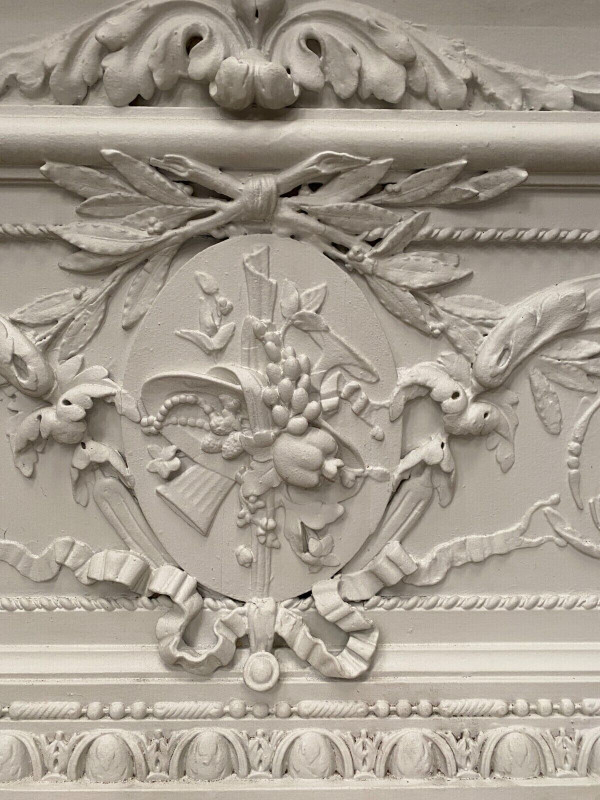 Decorative panel or door top in wood and patinated stucco 19th century