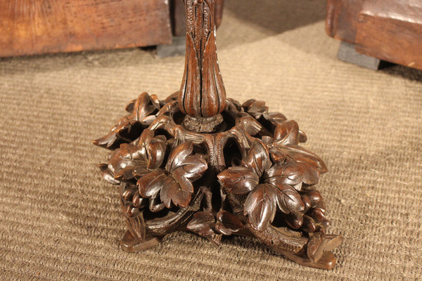 Black Forest type pedestal table Beautiful 19th century travel clock circa 1820, called a nasturtium, also serving as an alarm clock, wire movement with advance or delay adjustment, nickel-plated bronze bell with double hammer, revised movement, very good condition.