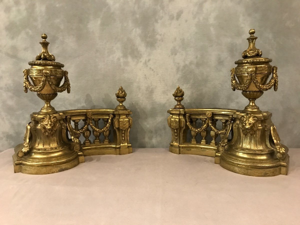 Beautiful old bronze andirons from the 19th century in Louis XVI style