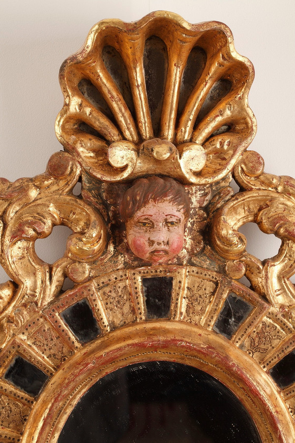 Paire de miroirs en bois doré de style vénitien 