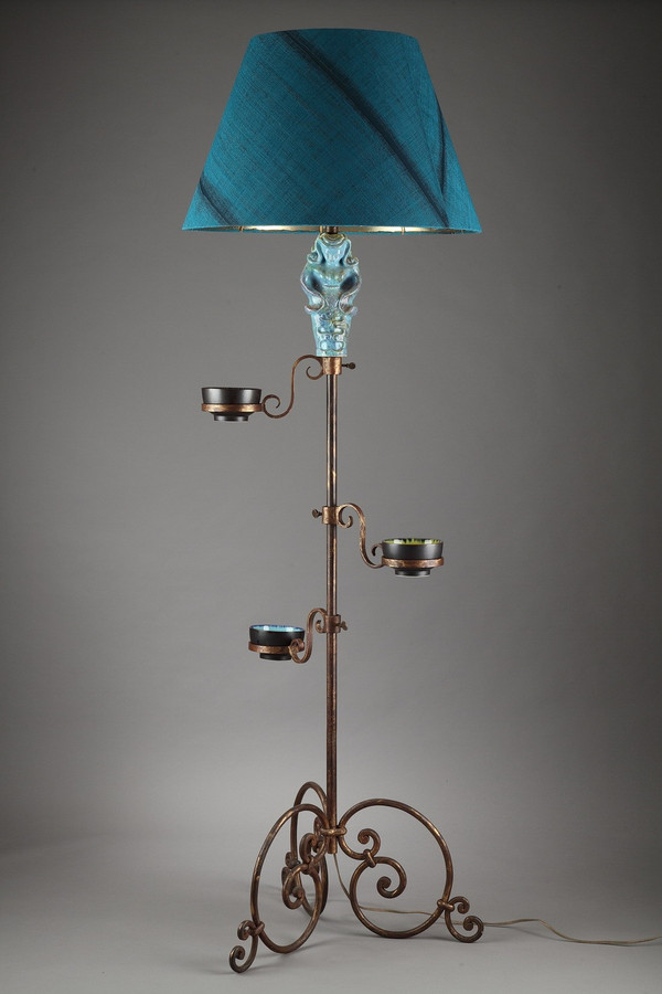 Tripod lampstand with blue ceramic figure