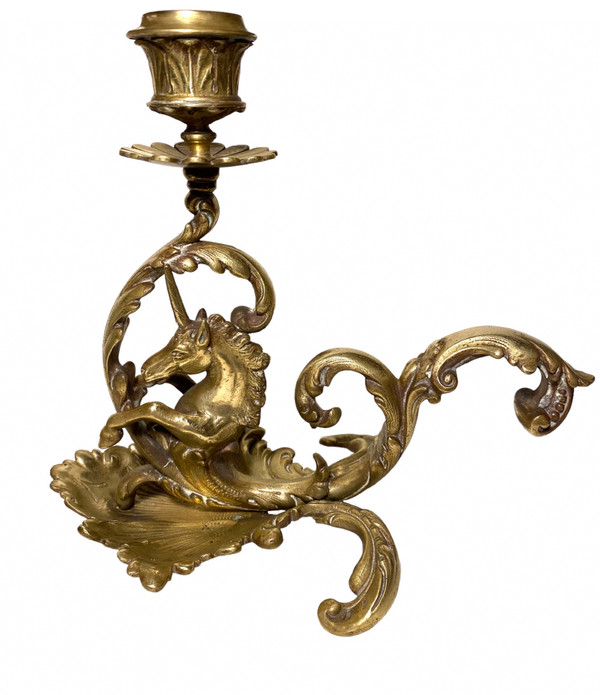 Pair of 19th century bronze candlesticks. Sea unicorns.