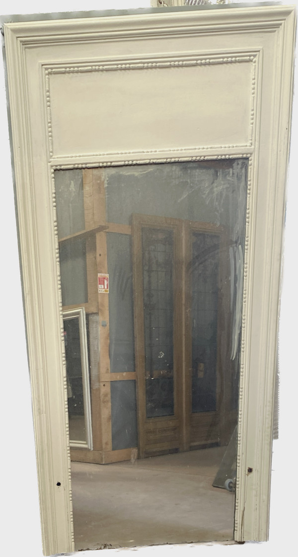 Louis XVI style mirror in wood and patinated stucco XX century