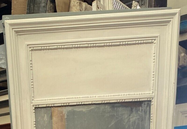 Louis XVI style mirror in wood and patinated stucco XX century