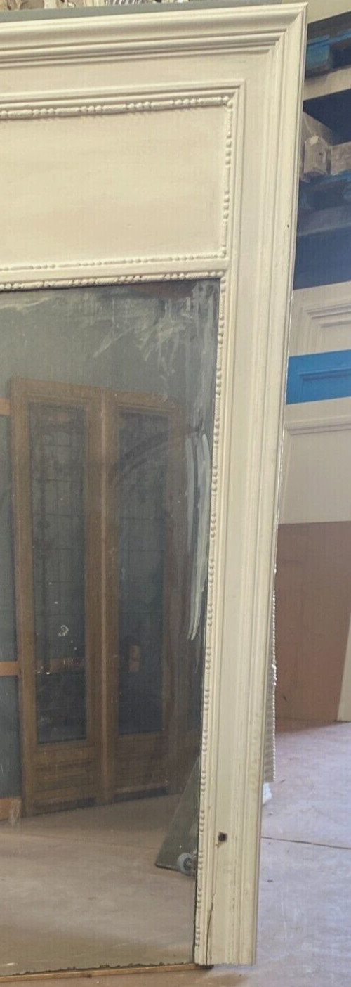 Louis XVI style mirror in wood and patinated stucco XX century
