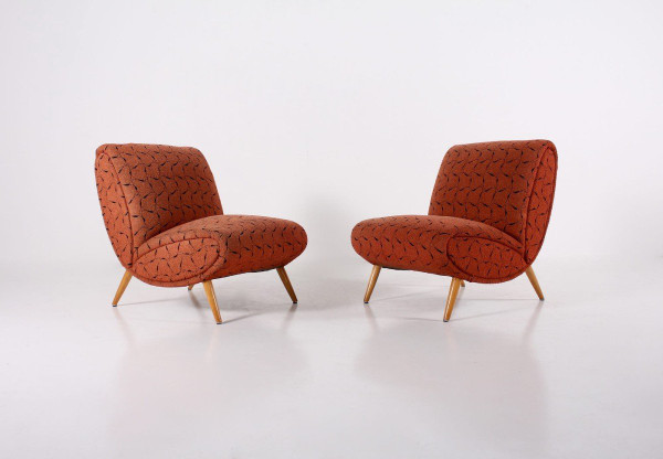 Two Low Chairs and an Ottoman Norman Bel Geddes