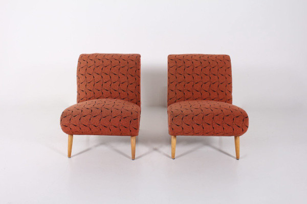 Two Low Chairs and an Ottoman Norman Bel Geddes