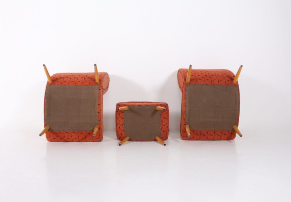 Two Low Chairs and an Ottoman Norman Bel Geddes