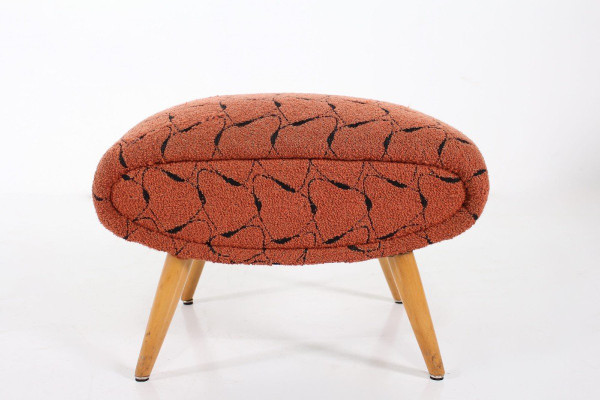 Two Low Chairs and an Ottoman Norman Bel Geddes