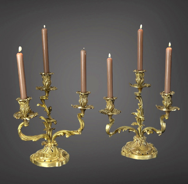 PAIR OF NUMBERED THREE-BRANCH GILT BRONZE CANDLE HOLDERS IN LOUIS XV STYLE