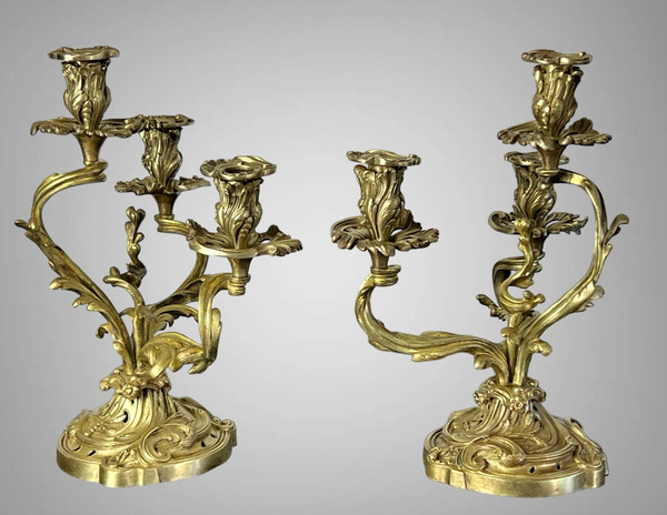 PAIR OF NUMBERED THREE-BRANCH GILT BRONZE CANDLE HOLDERS IN LOUIS XV STYLE