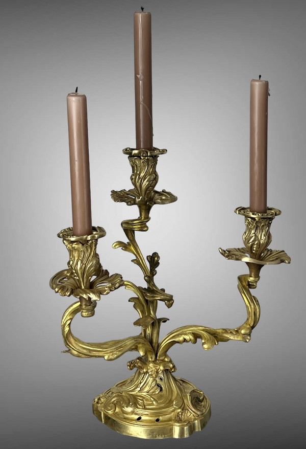 PAIR OF NUMBERED THREE-BRANCH GILT BRONZE CANDLE HOLDERS IN LOUIS XV STYLE