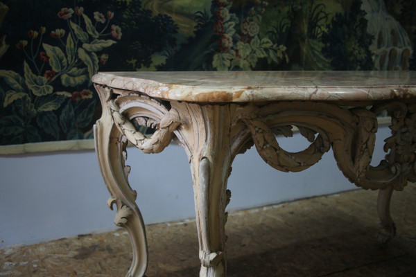 Large console in carved and cream-colored basswood from the Louis XV period