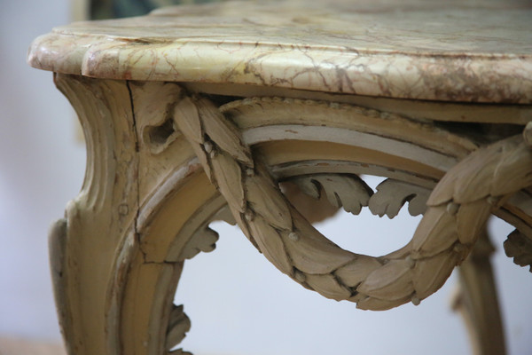 Large console in carved and cream-colored basswood from the Louis XV period
