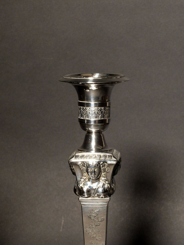 Pair of candlesticks in solid silver, with the count's coat of arms, by Denis Garreau