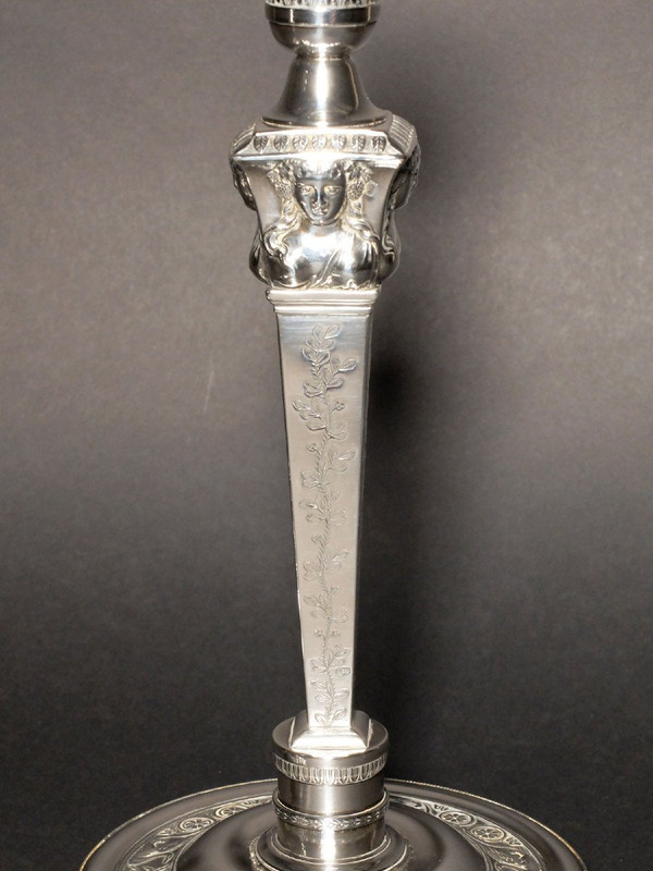 Pair of candlesticks in solid silver, with the count's coat of arms, by Denis Garreau