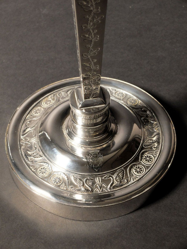 Pair of candlesticks in solid silver, with the count's coat of arms, by Denis Garreau
