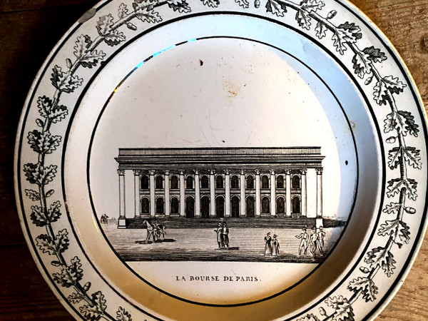  Suite of 4 Choisy earthenware plates representing monuments of Paris and Versailles 19th