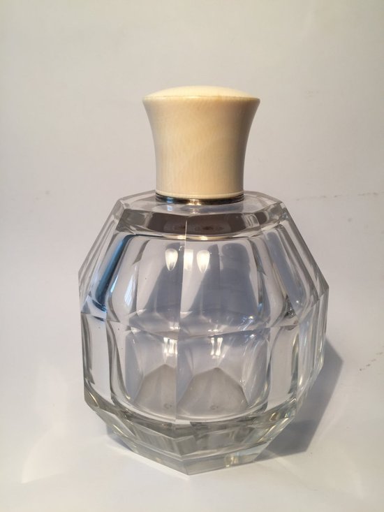 Three Art Deco Bottles. Crystal and Ivory.