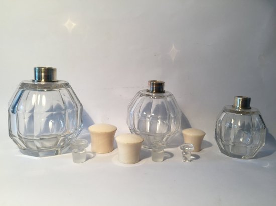 Three Art Deco Bottles. Crystal and Ivory.