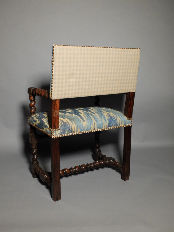 Louis XIII period armchair with lion's muzzles