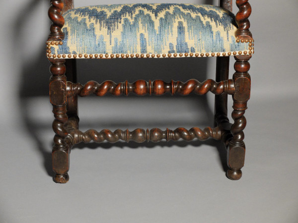 Louis XIII period armchair with lion's muzzles