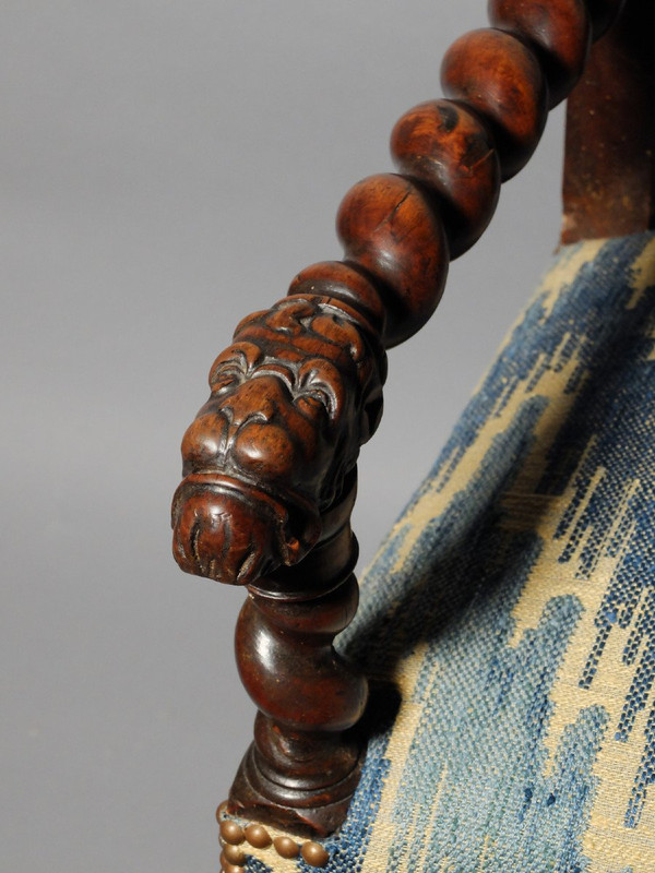 Louis XIII period armchair with lion's muzzles