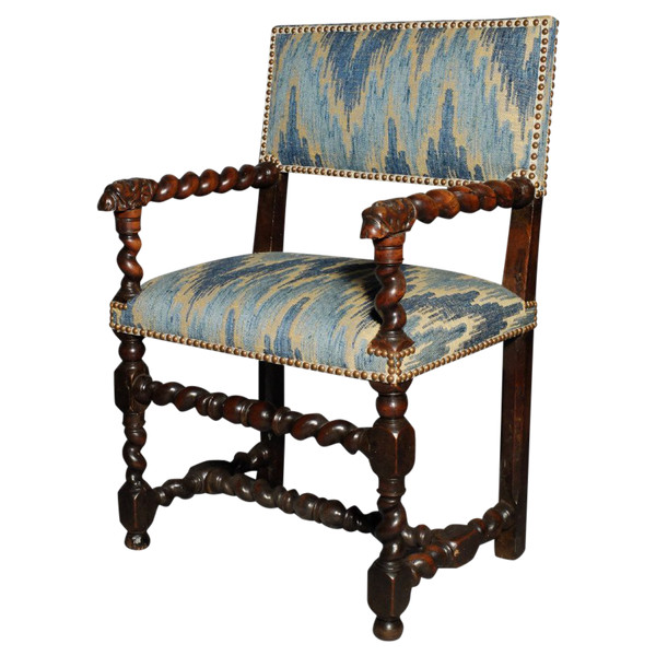 Louis XIII period armchair with lion's muzzles
