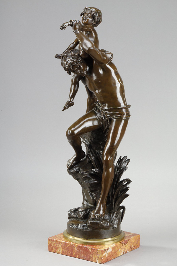 Bronzo con patina marrone raffigurante un Uomo che porta un bambino sulla schiena, di Gaston Leroux (1854-1942)