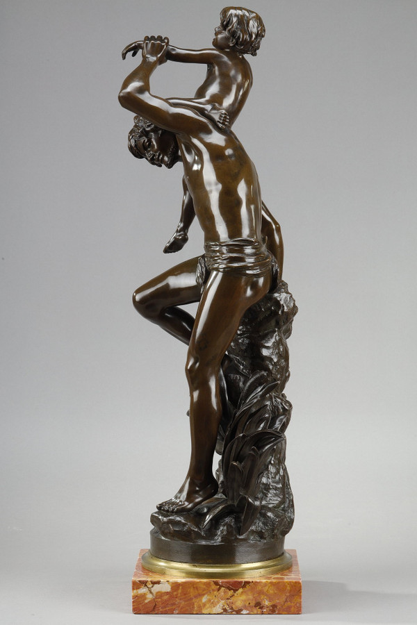 Bronzo con patina marrone raffigurante un Uomo che porta un bambino sulla schiena, di Gaston Leroux (1854-1942)