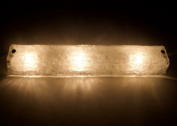 Luce di cortesia in vetro ghiaccio.