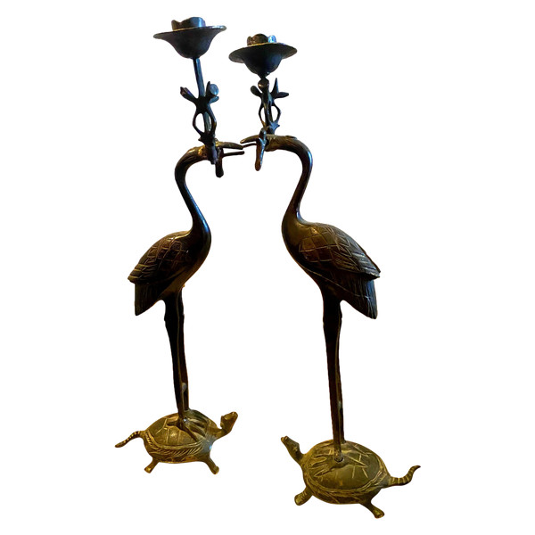 Pair of dark green patinated bronze candlesticks with articulated bobbins in the beak of a heron resting on a turtle 19th century Japanese