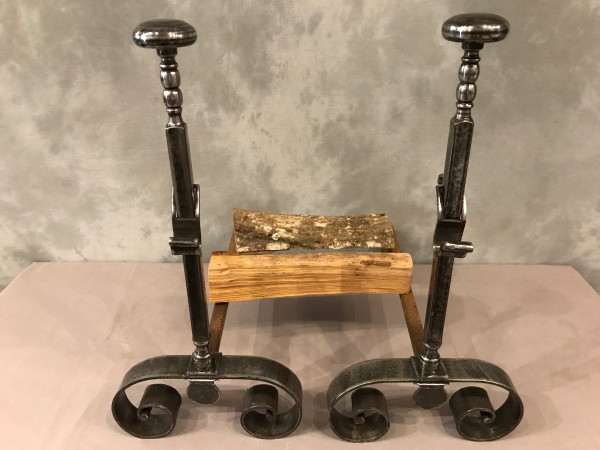 Pair of 19th century polished iron andirons