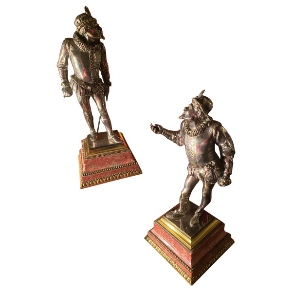 Due statuette in bronzo argentato "Les Mignons Duellistes" di Emile Guillemin su basi di rodocrosite