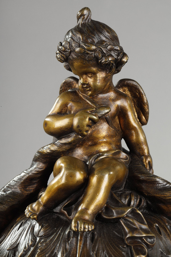 PAIR OF COVERED VASES, IN FINELY CHASED BRONZE WITH A RICH ROTATING DECORATION