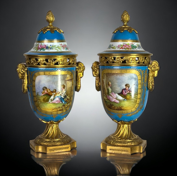 PAIR OF COVERED POTS IN SÈVRES PORCELAIN DECORATED WITH GILT BRONZE NAPOLEON III