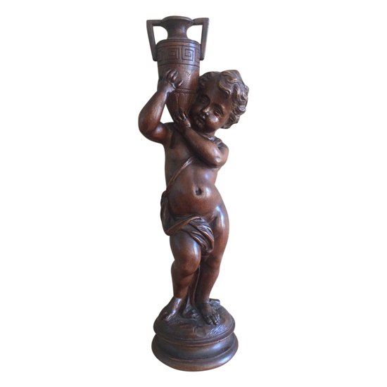 Ventesima statuetta in legno intagliato. Bambino Che Porta Un Vaso.