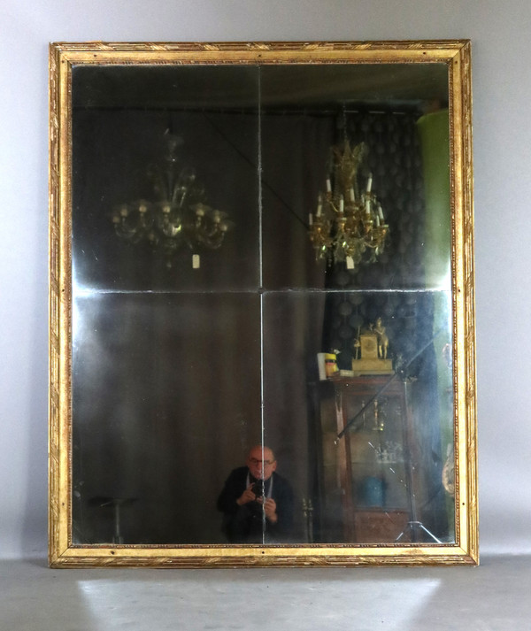Grand miroir en bois doré fin XVIII début XIX