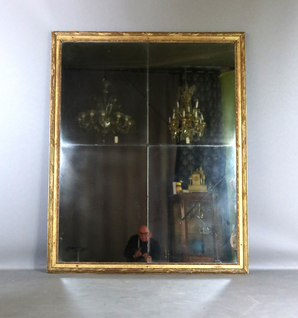 Grand miroir en bois doré fin XVIII début XIX