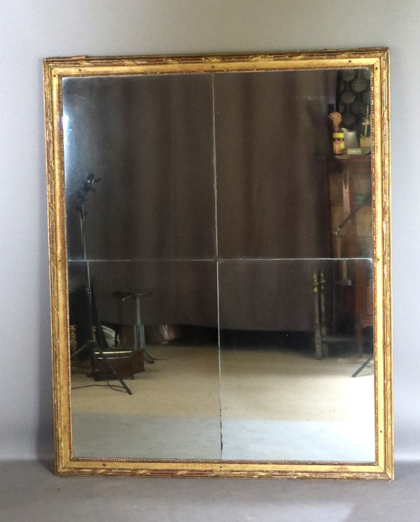 Grand miroir en bois doré fin XVIII début XIX