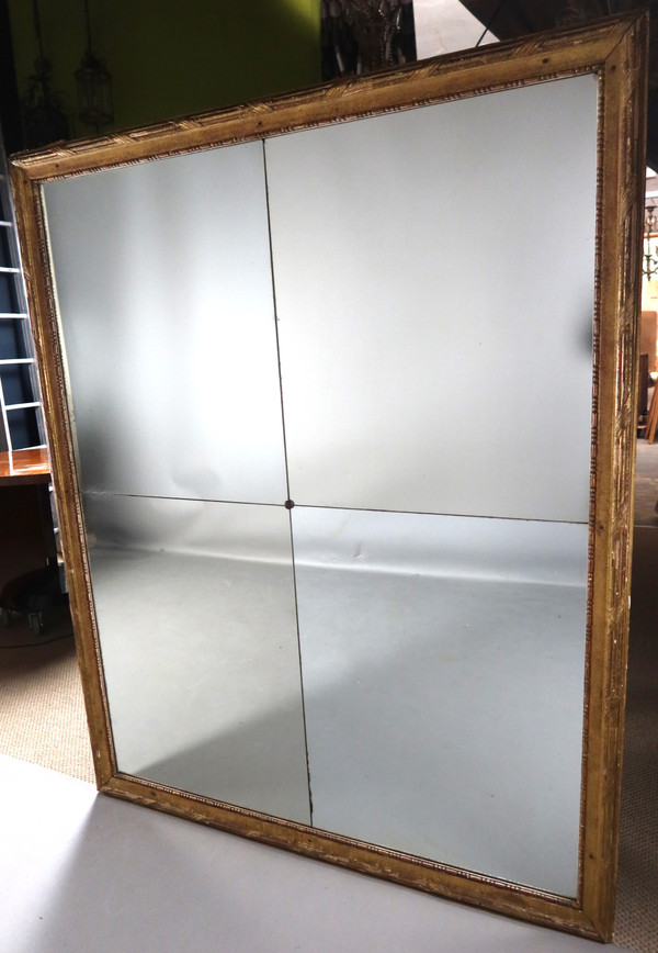 Grand miroir en bois doré fin XVIII début XIX