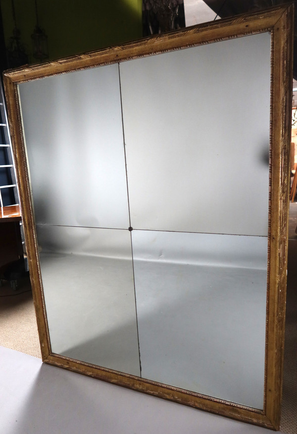 Grand miroir en bois doré fin XVIII début XIX