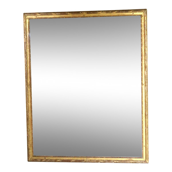 Grand miroir en bois doré fin XVIII début XIX